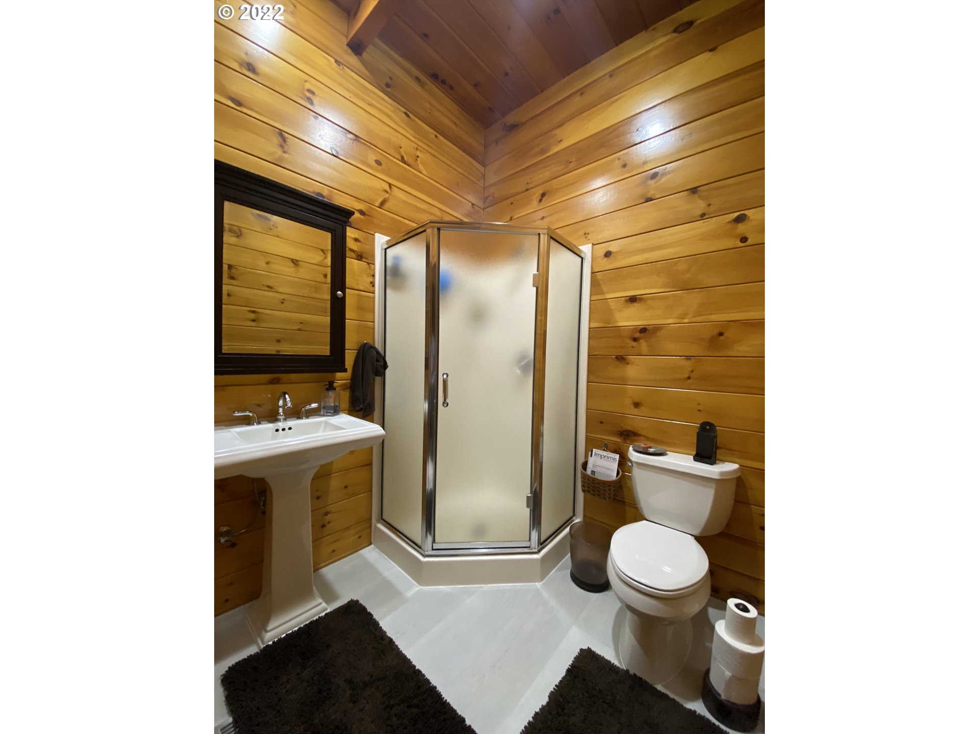 8757 Southeast Alder Ridge Road Damascus, OR 97089 - Photo 14 of 25 a bathroom with a toilet and a shower