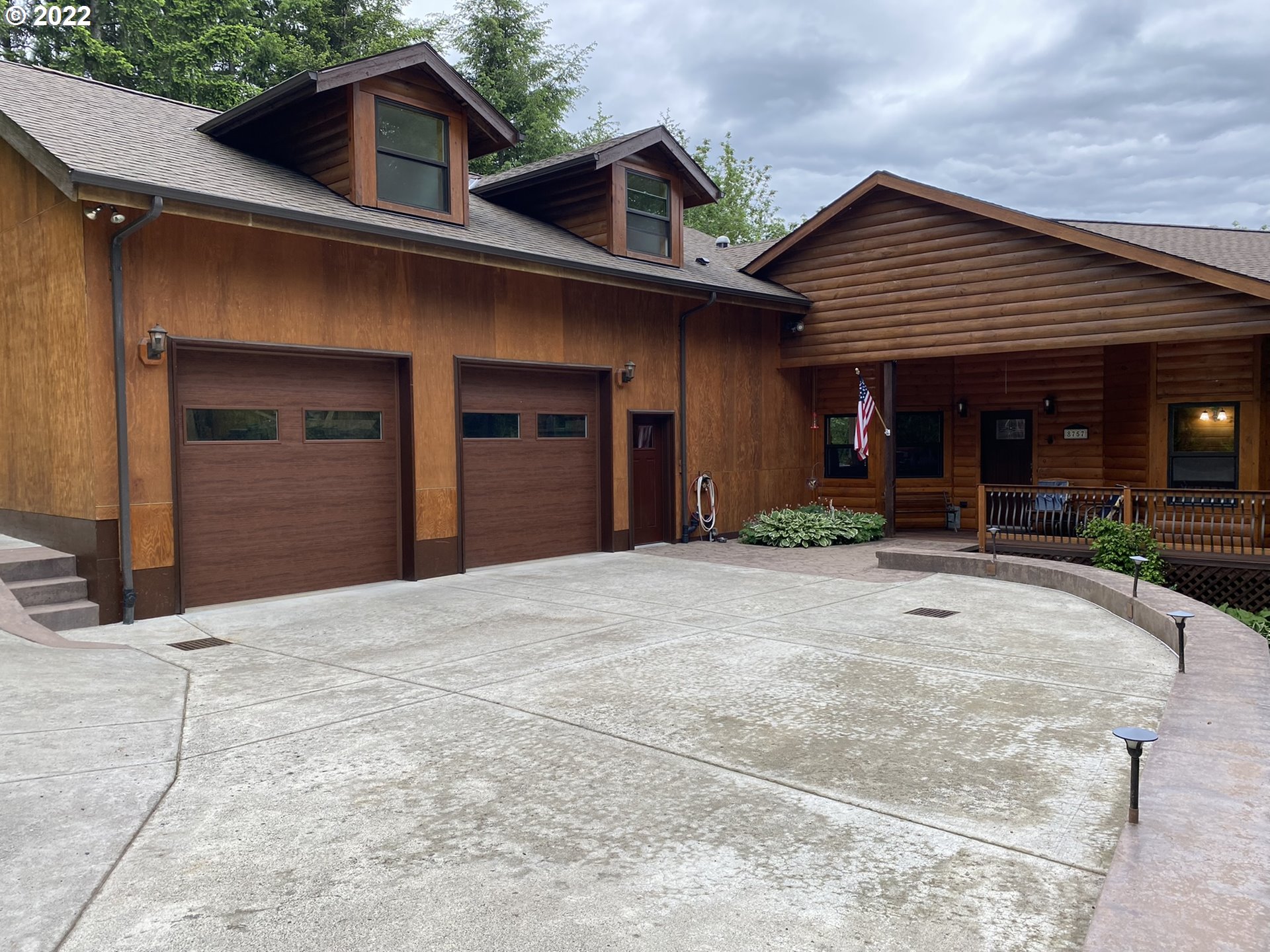 8757 Southeast Alder Ridge Road Damascus, OR 97089 - Photo 3 of 25 a view of a house with entertaining space
