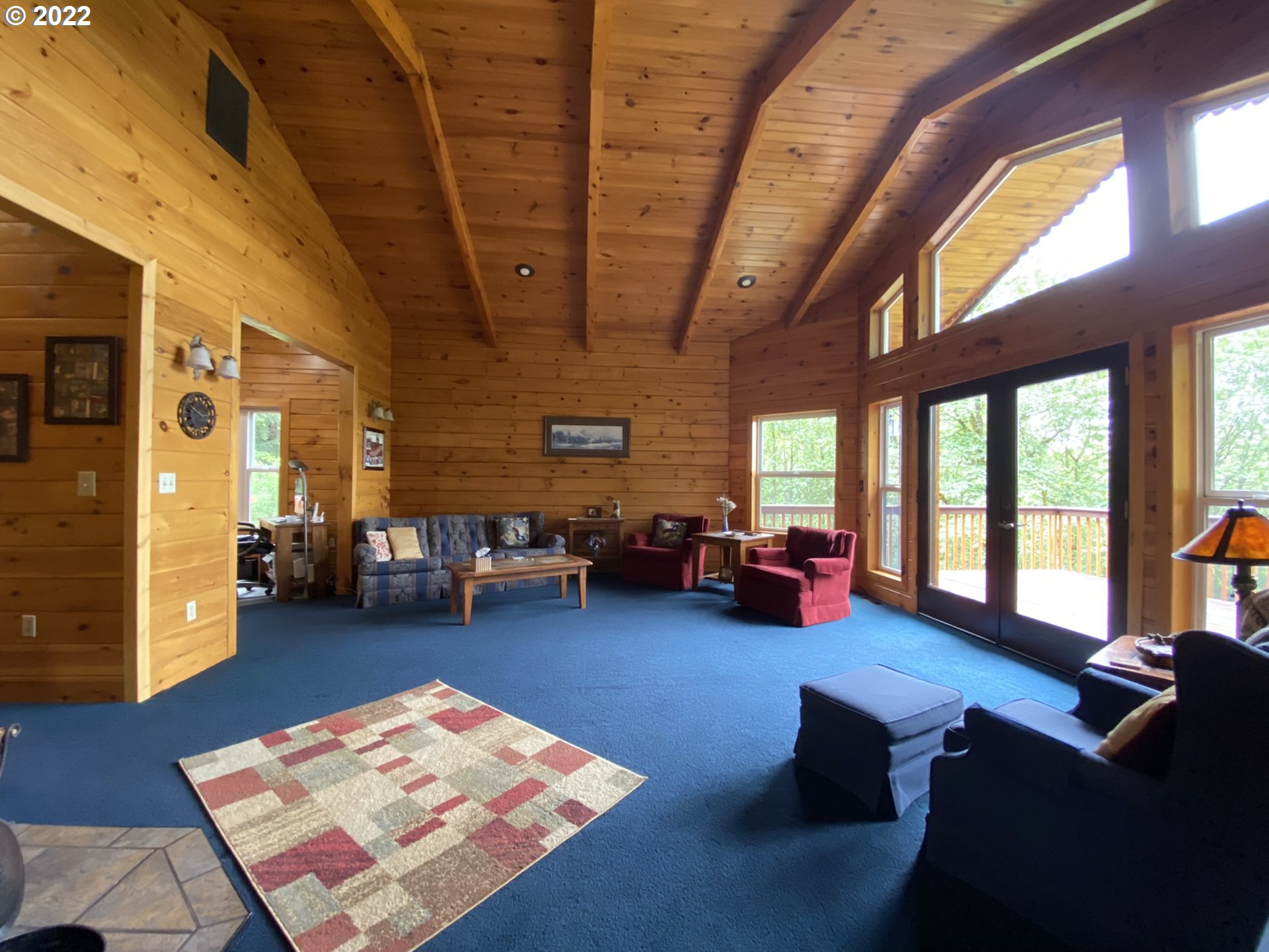 8757 Southeast Alder Ridge Road Damascus, OR 97089 - Photo 5 of 25 a living room with furniture and a couch