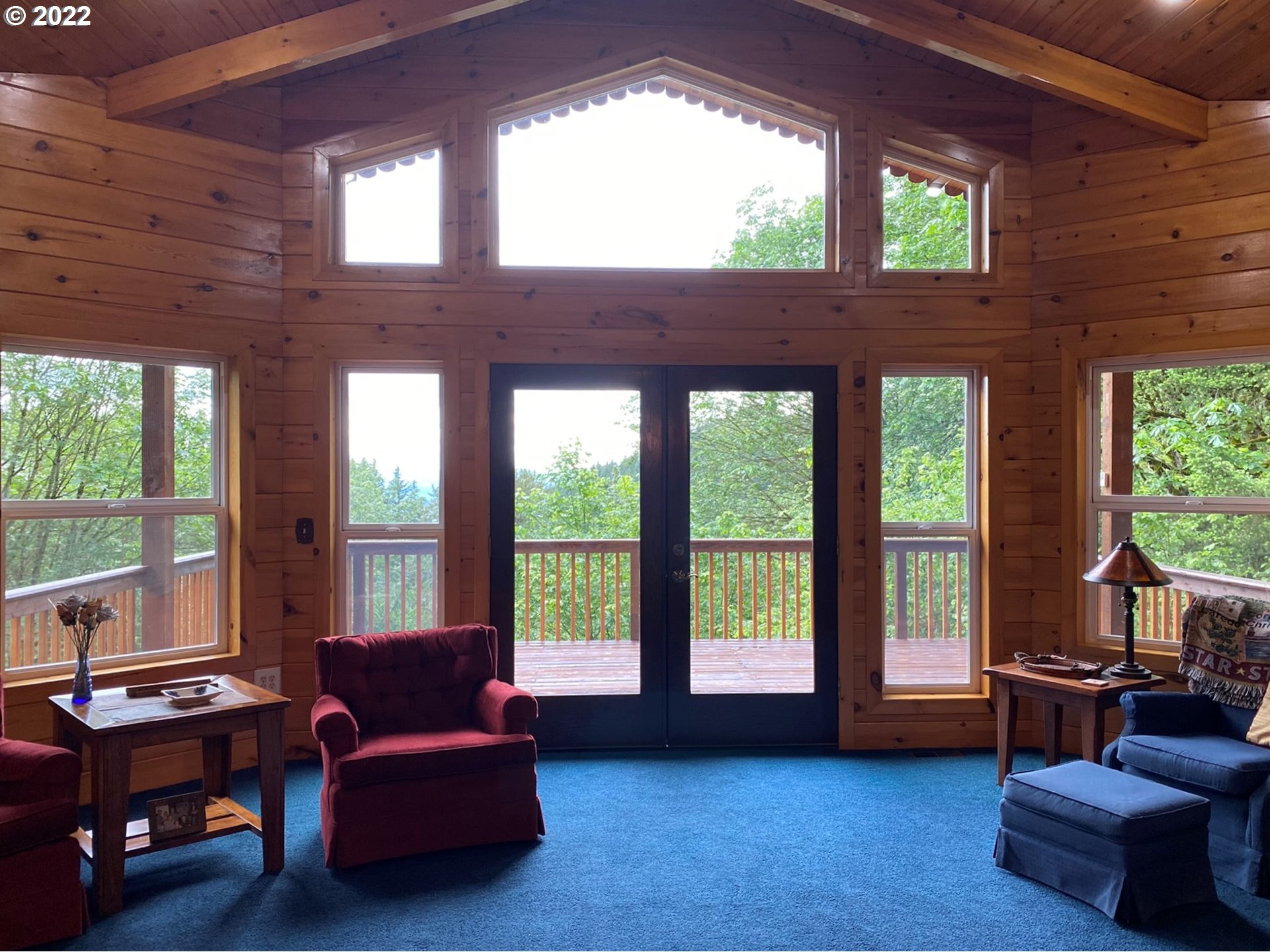 8757 Southeast Alder Ridge Road Damascus, OR 97089 - Photo 7 of 25 a living room with furniture and windows