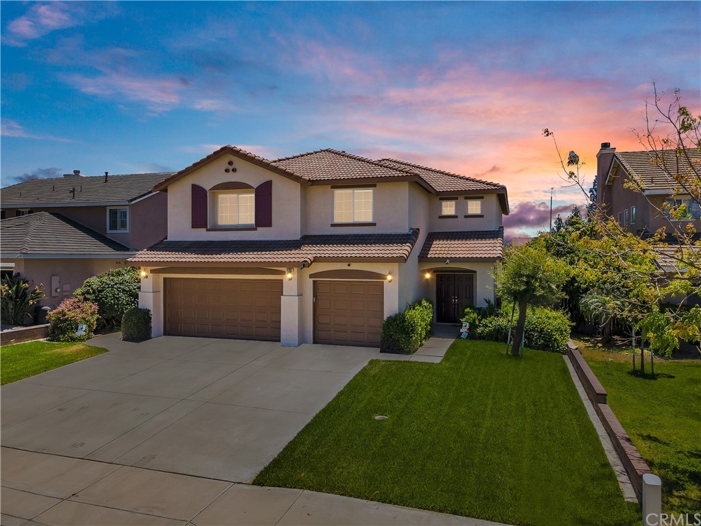 19781 Adirondack Lane Riverside, CA 92508 - Photo 1 of 1 a front view of a house with a yard