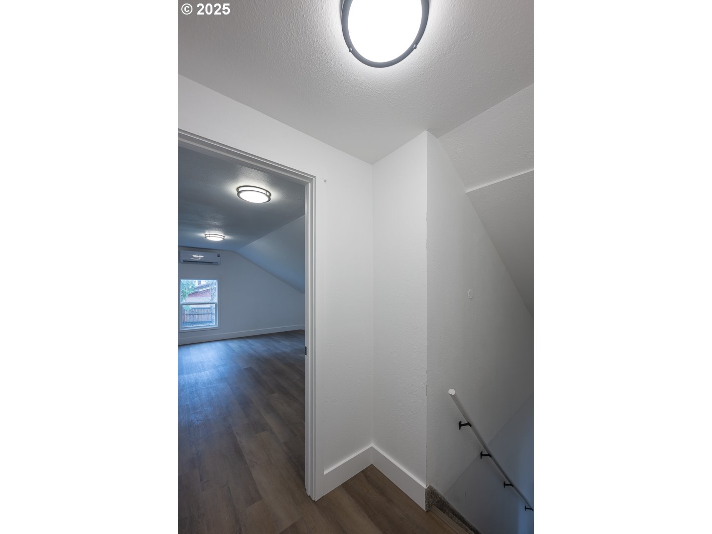 445 Southwest Mill Street Sheridan, OR 97378 - Photo 35 of 38 a view of a room with wooden floor