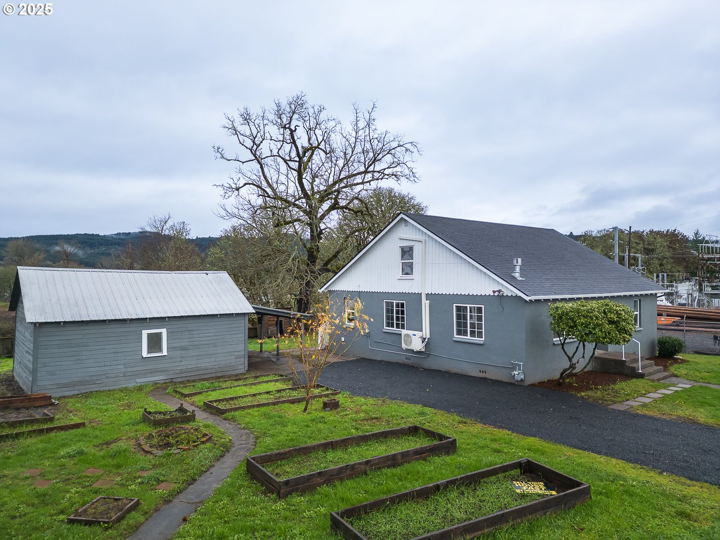 445 Southwest Mill Street Sheridan, OR 97378 - Photo 6 of 38 front view of a house with a yard
