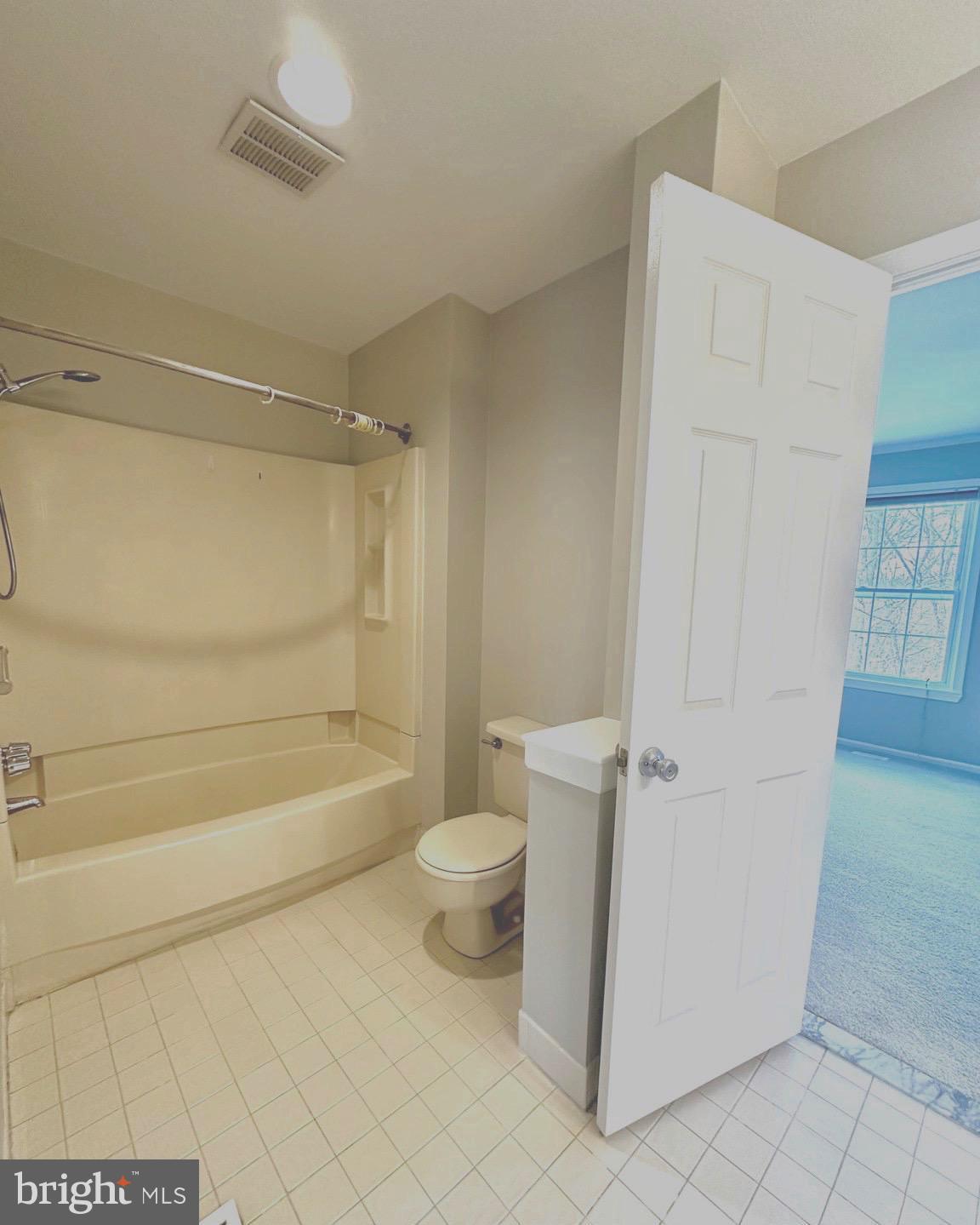 41 Victoria Drive Aston, PA 19014 - Photo 14 of 19 a bathroom with a toilet and a shower