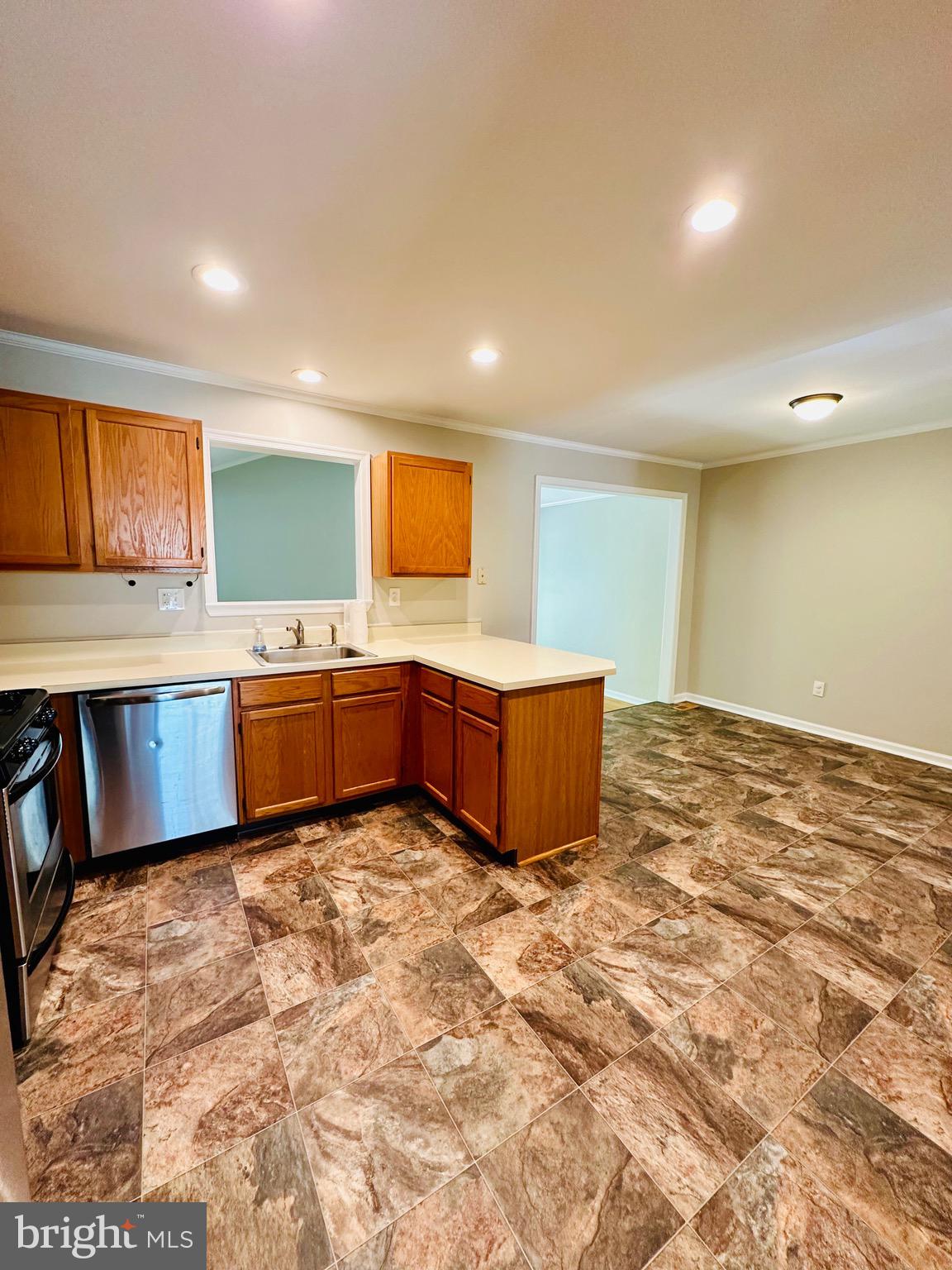 41 Victoria Drive Aston, PA 19014 - Photo 5 of 19 a view of a kitchen with sink microwave and cabinets