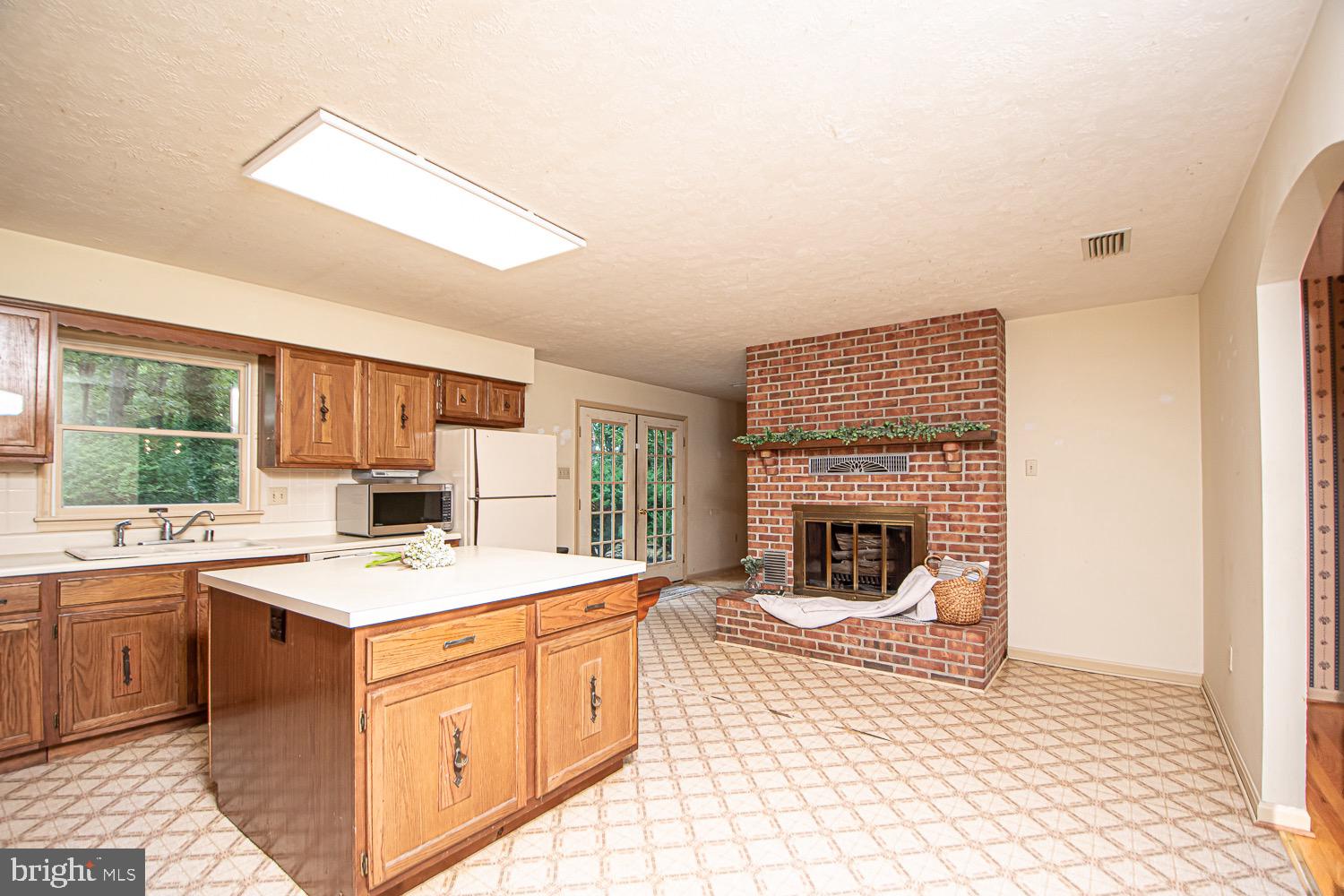 114 Winding Ridge Lane Winchester, VA 22603 - Photo 4 of 73 Kitchen with fireplace