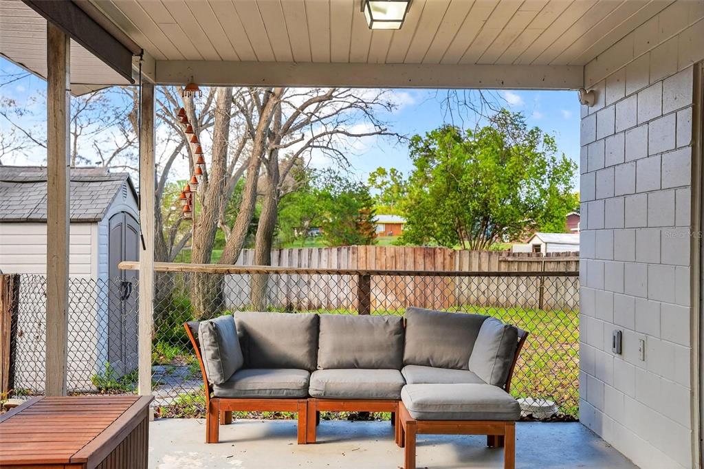 106 Portland Street Eustis, FL 32726 - Photo 12 of 71 a balcony with furniture and a potted plant