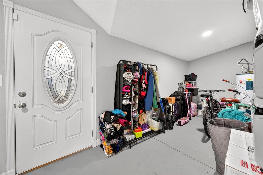 106 Portland Street Eustis, FL 32726 - Photo 60 of 71 a view of a garage with toys