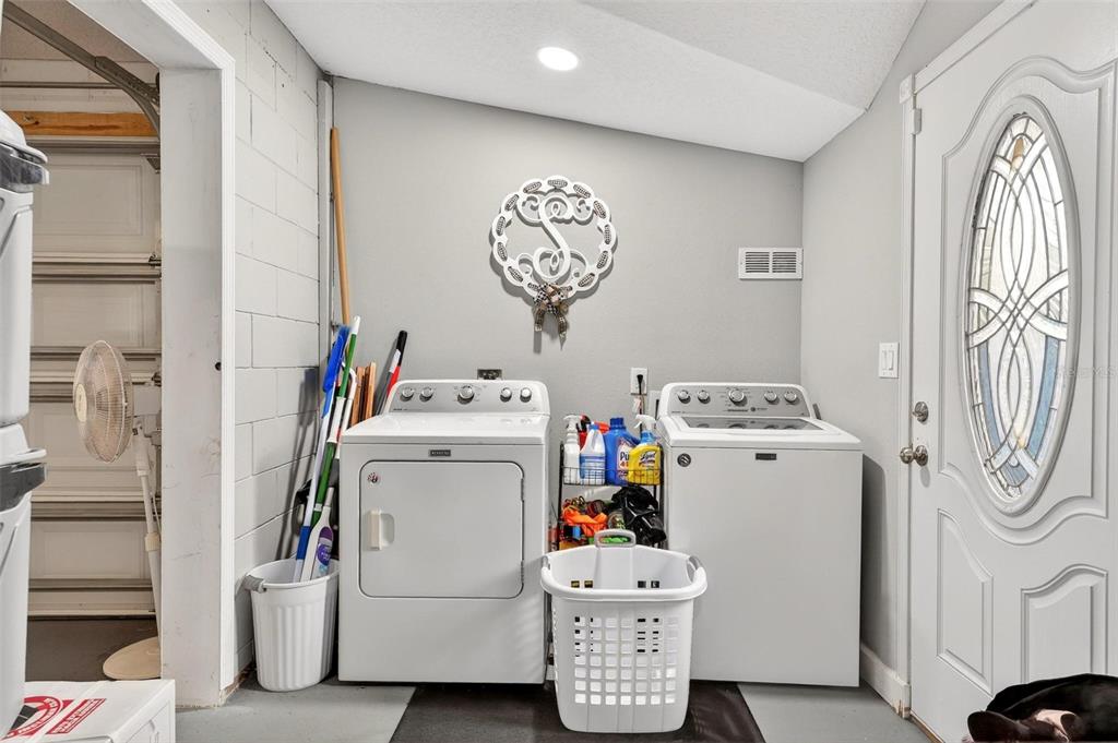 106 Portland Street Eustis, FL 32726 - Photo 61 of 71 a utility room with dryer and washer