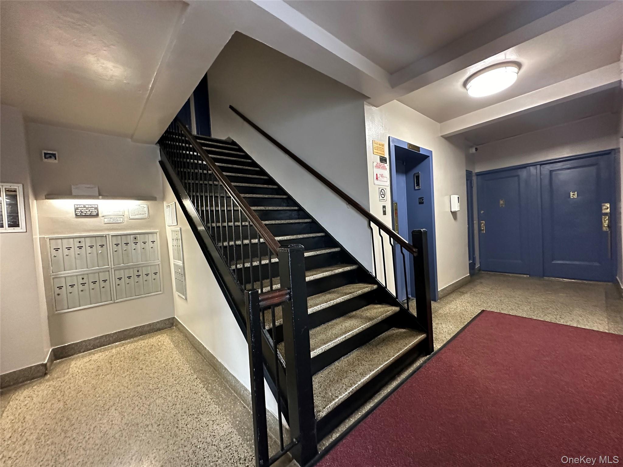 112-25 34th Avenue, Unit 6H Queens, NY 11368 - Photo 24 of 48 Lobby area access the stairs and elevator. Mail area on the lobby.