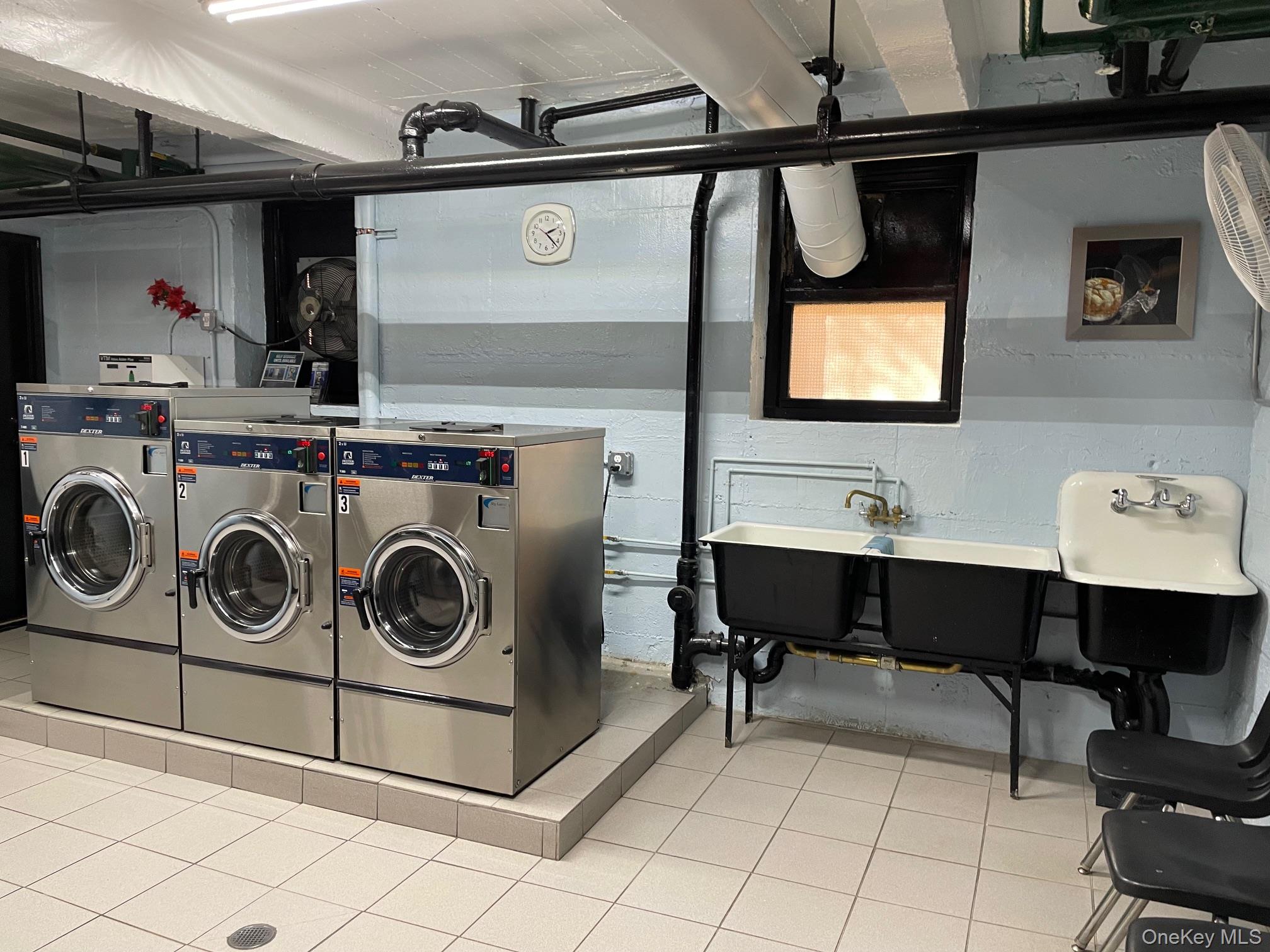112-25 34th Avenue, Unit 6H Queens, NY 11368 - Photo 30 of 48 Laundry room renovated 2020 has sink and bathroom