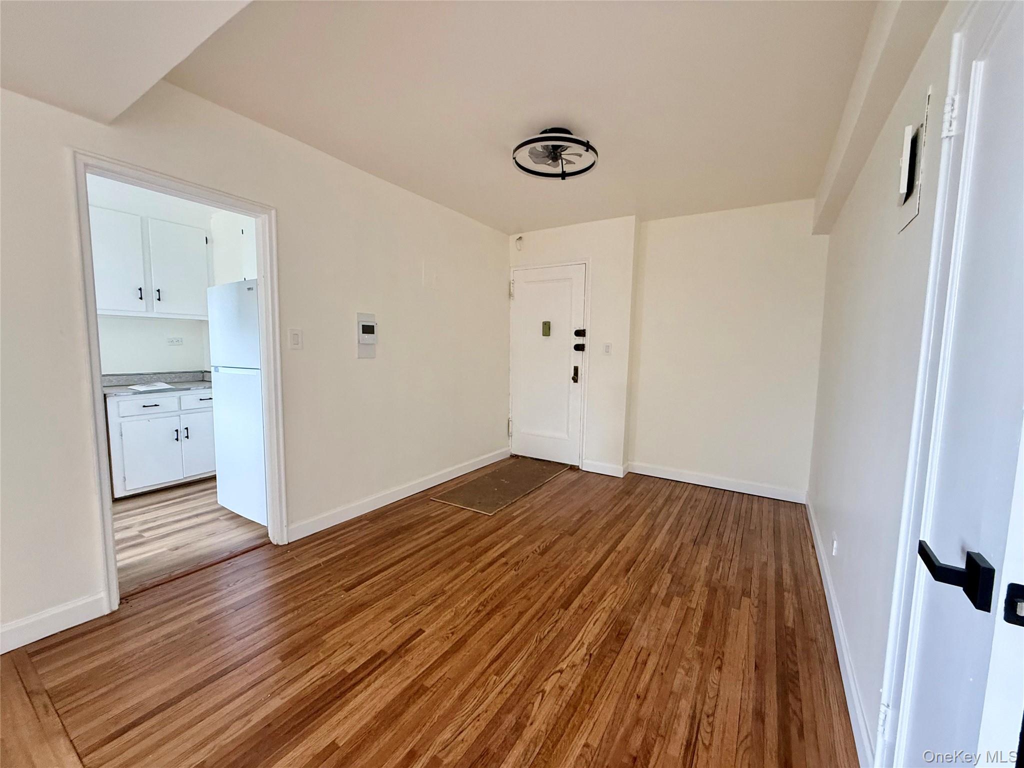 112-25 34th Avenue, Unit 6H Queens, NY 11368 - Photo 6 of 48 Open to the living area, large coat closet, ceiling light, hardwood floors