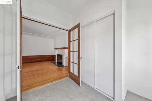 a bathroom with a shower sink and mirror