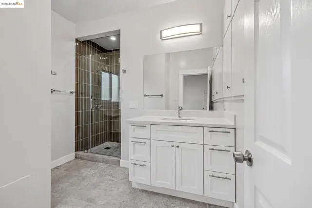 a view of a livingroom with stairs and furniture