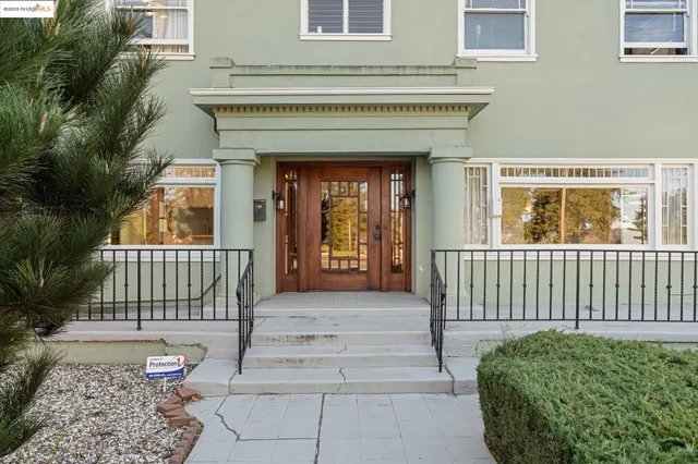 a front view of a house with a porch