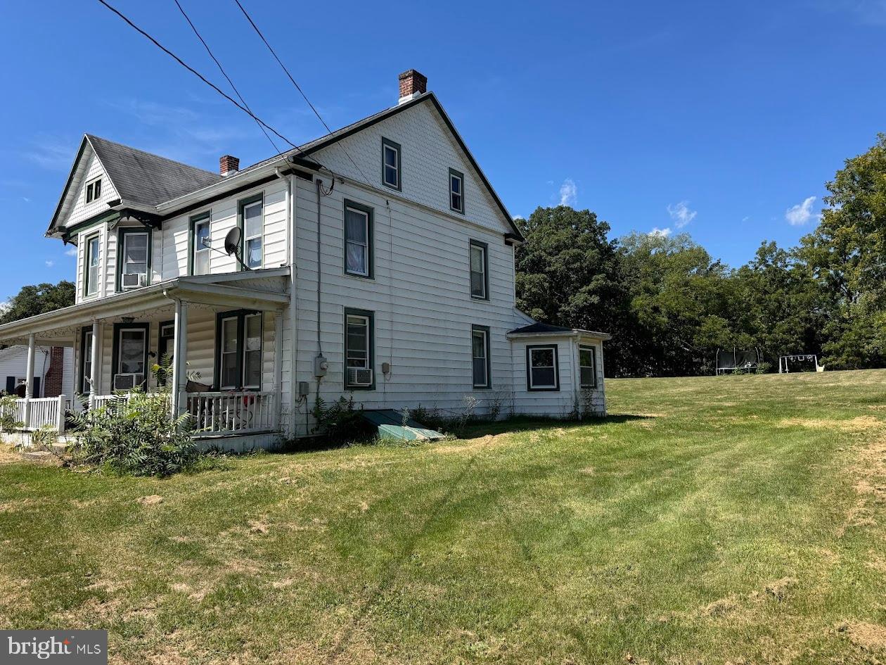2691 Emmitsburg Road Gettysburg, PA 17325 - Photo 2 of 4 a view of a house with yard and tree s