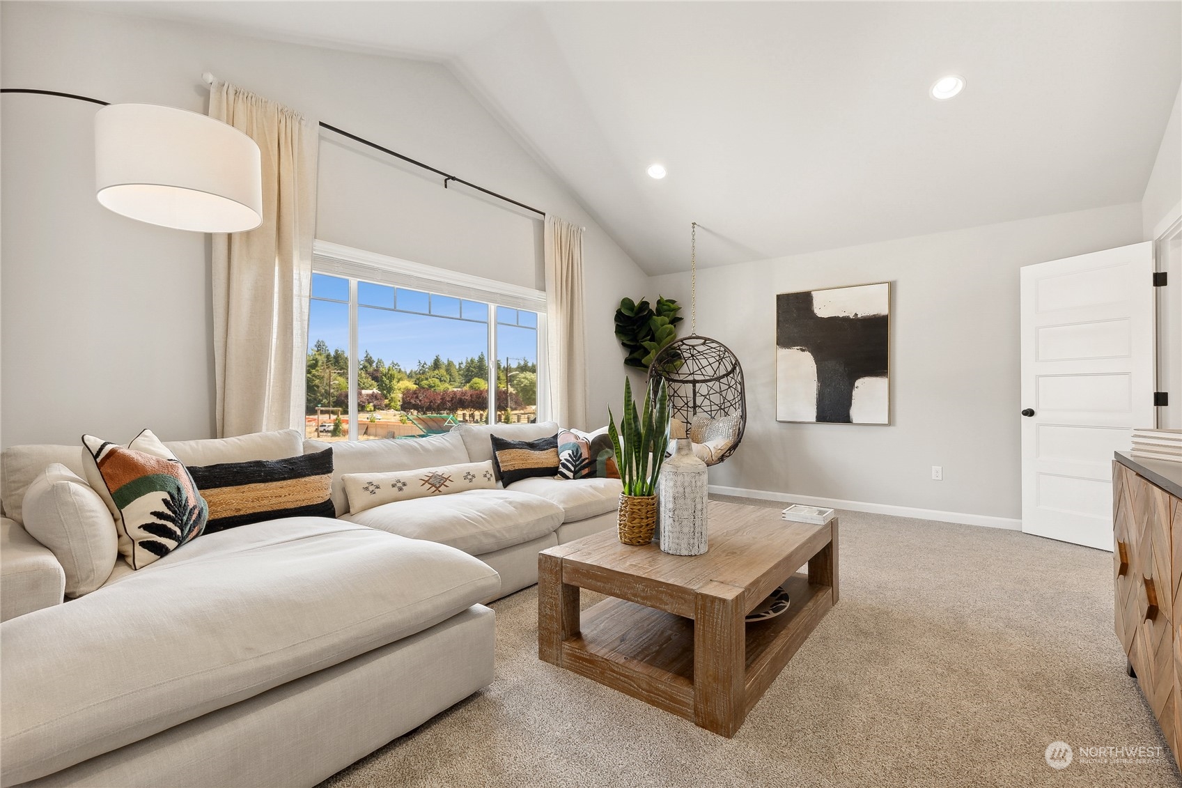 3016 Stephanie Loop Northeast Lacey, WA 98516 - Photo 19 of 19 a living room with furniture and a table
