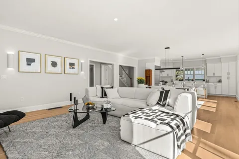 a living room with furniture and a couch