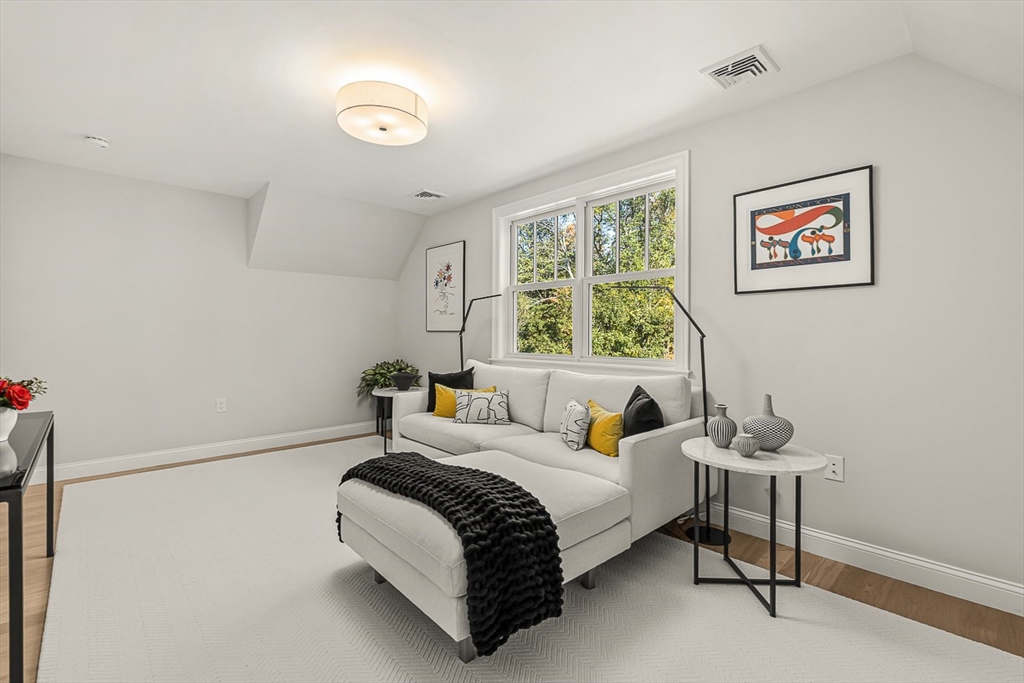 5 Peakes Lane, Unit 5 Weston, MA 02493 - Photo 27 of 32 a bedroom with a bed and a window