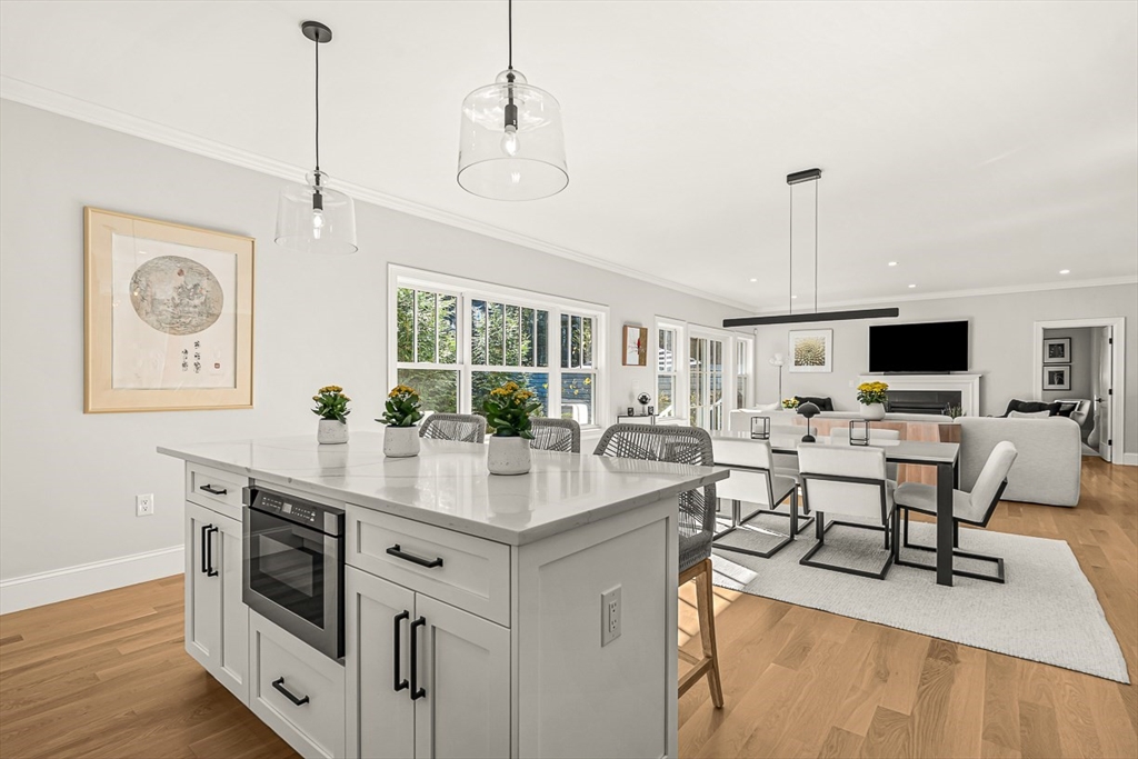 5 Peakes Lane, Unit 5 Weston, MA 02493 - Photo 5 of 32 a view of a livingroom with furniture and a flat screen tv