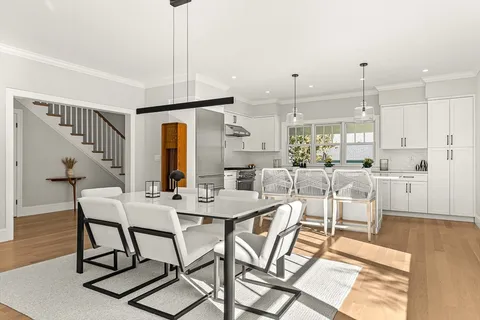 a view of a dining room with furniture