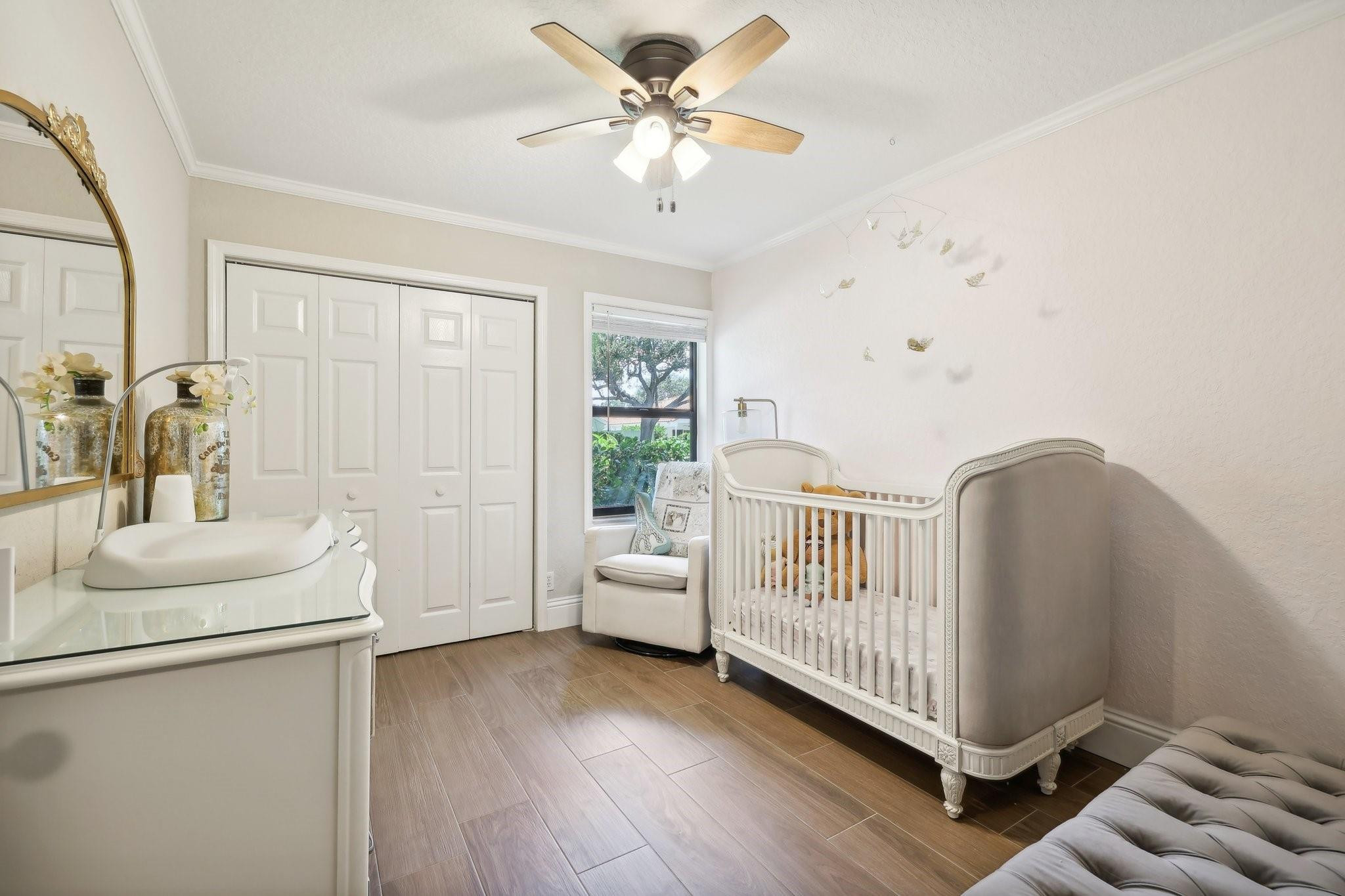 4035 Sabal Lakes Road Delray Beach, FL 33445 - Photo 25 of 43 a living room with furniture and a wooden floor