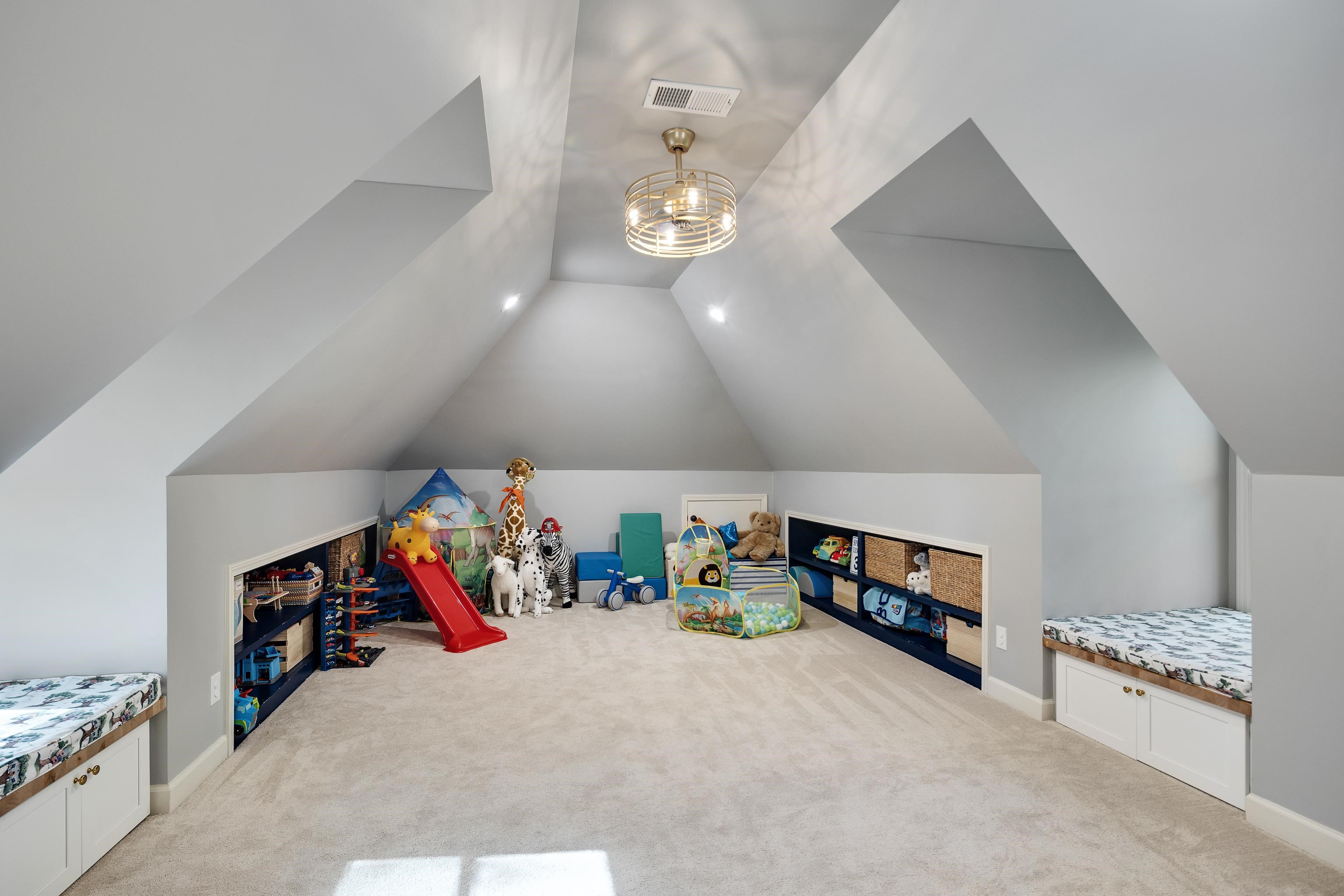 237 Windover Road Memphis, TN 38111 - Photo 4 of 37 Rec room with light colored carpet and a chandelier