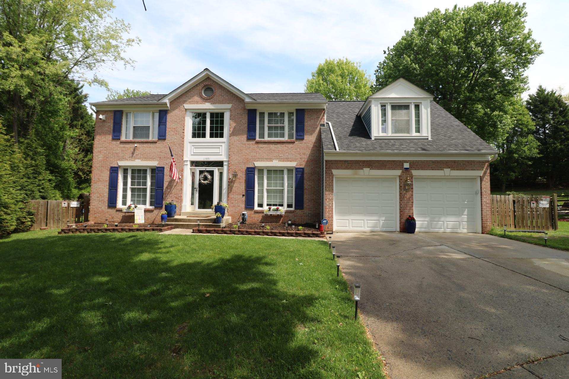 11901 Rustic Farm Court Germantown, MD 20874 - Photo 106 of 134 Charming brick home with lush greenery.