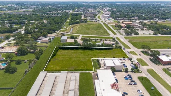 a view of a lake with a big yard