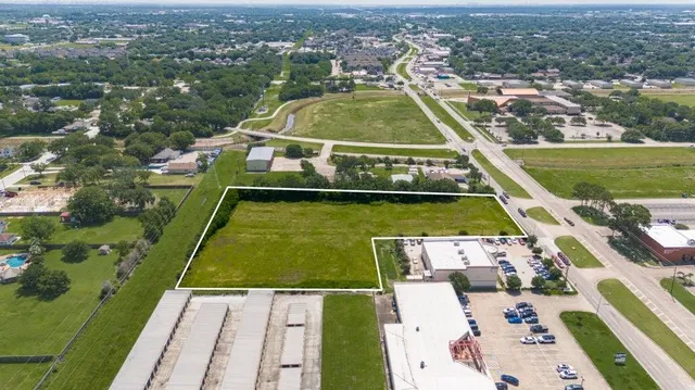 a view of a lake with a big yard