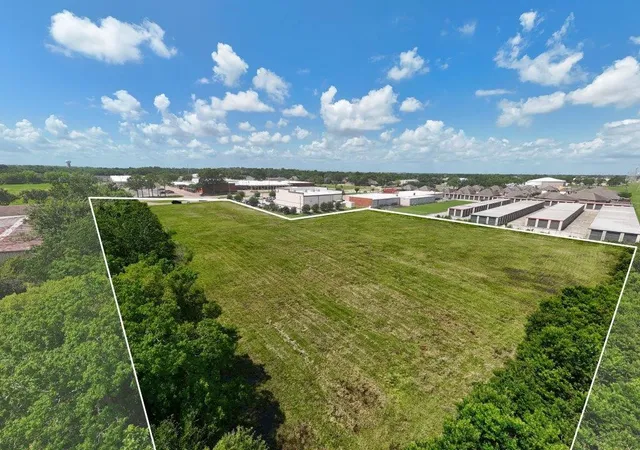 a view of a golf course with a fountain