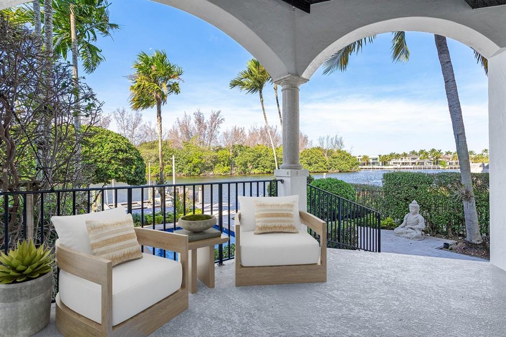 549 Northeast 19th Avenue, Unit C Deerfield Beach, FL 33441 - Photo 21 of 79 a view of a patio with couches chairs and a table