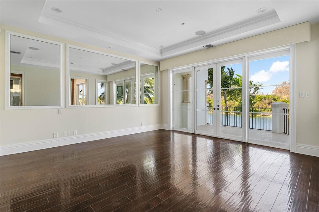 549 Northeast 19th Avenue, Unit C Deerfield Beach, FL 33441 - Photo 22 of 79 a view of an entryway with wooden floor