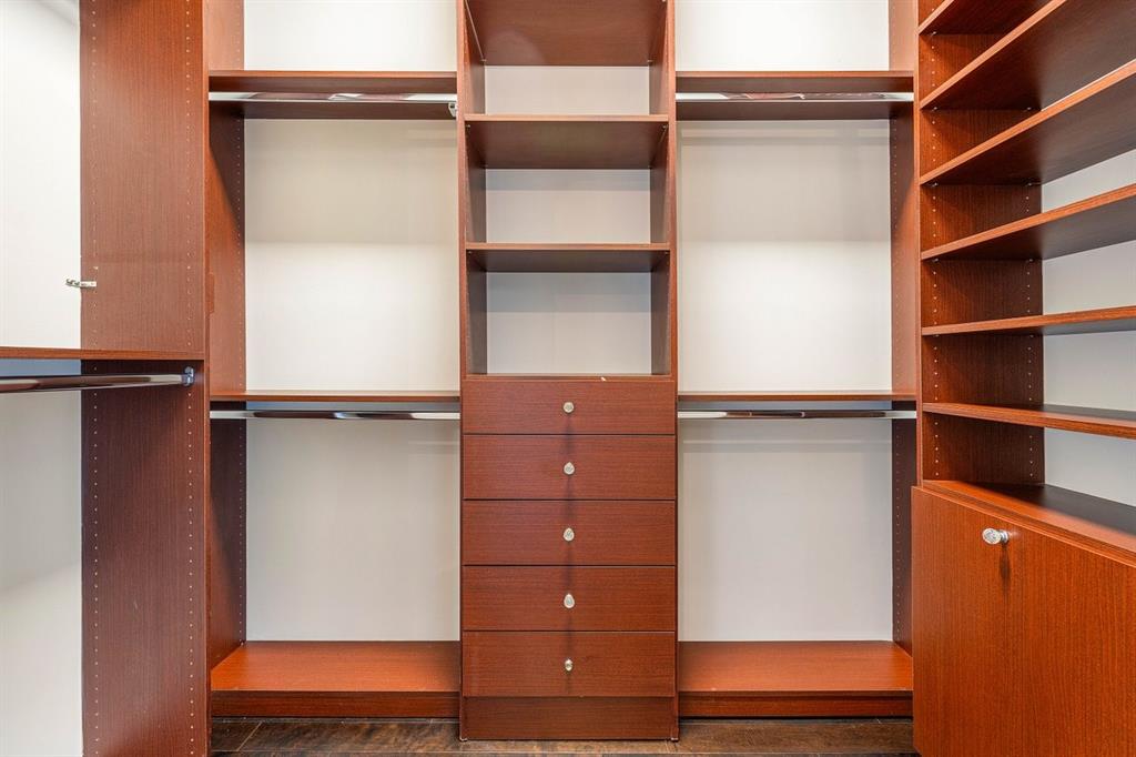 549 Northeast 19th Avenue, Unit C Deerfield Beach, FL 33441 - Photo 33 of 79 a view of closet with wooden floor
