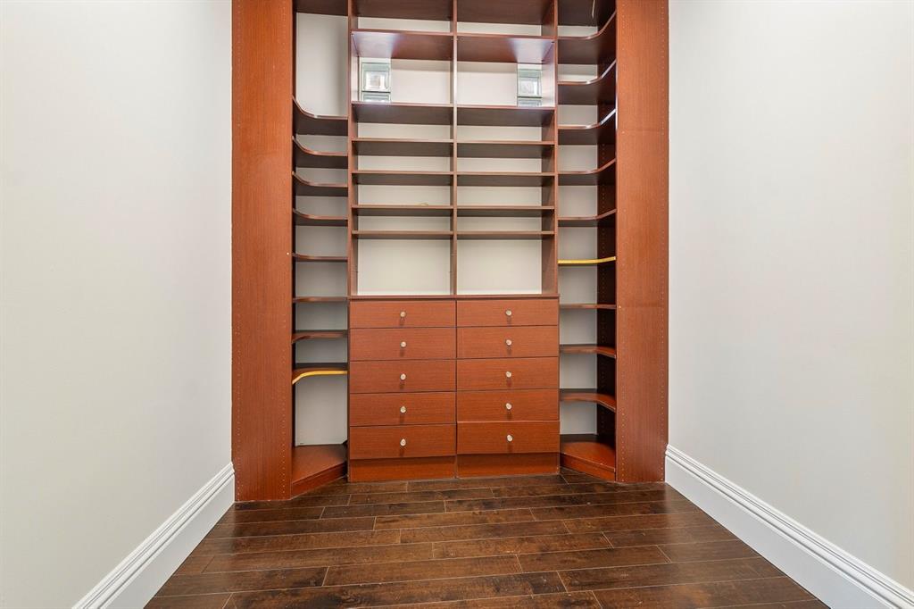 549 Northeast 19th Avenue, Unit C Deerfield Beach, FL 33441 - Photo 34 of 79 a view of a room with shelf