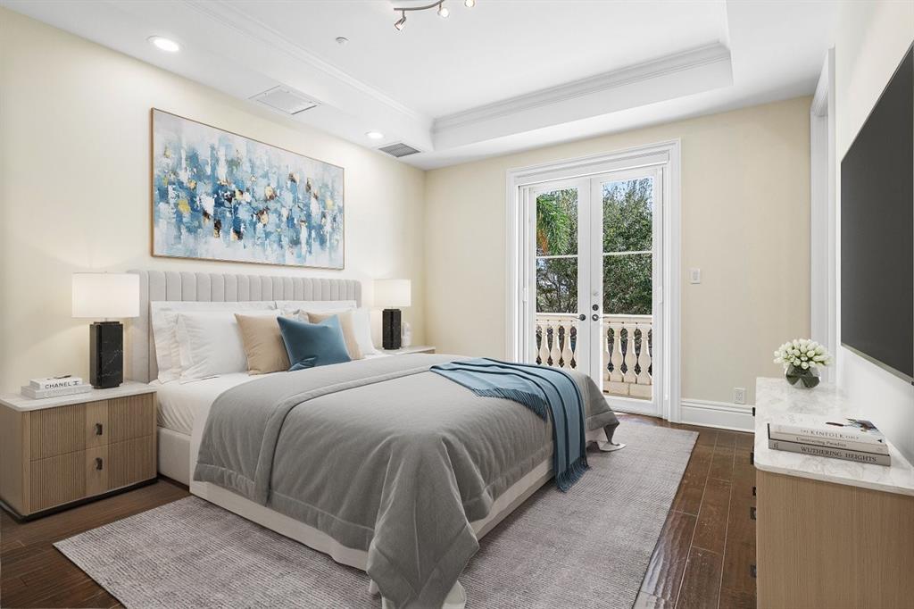 549 Northeast 19th Avenue, Unit C Deerfield Beach, FL 33441 - Photo 35 of 79 a bedroom with a large bed and a window