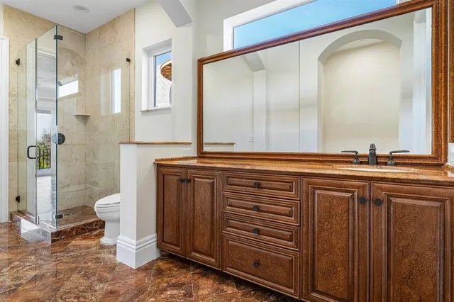 a front view of a house with parking space