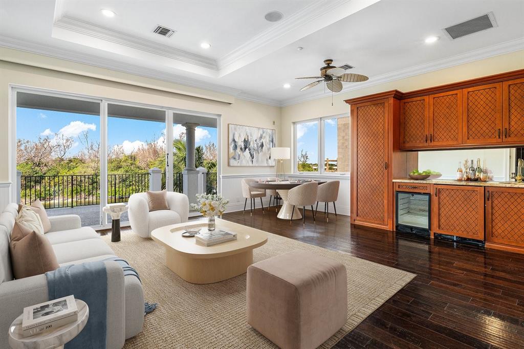 549 Northeast 19th Avenue, Unit C Deerfield Beach, FL 33441 - Photo 43 of 79 a living room with furniture and a large window