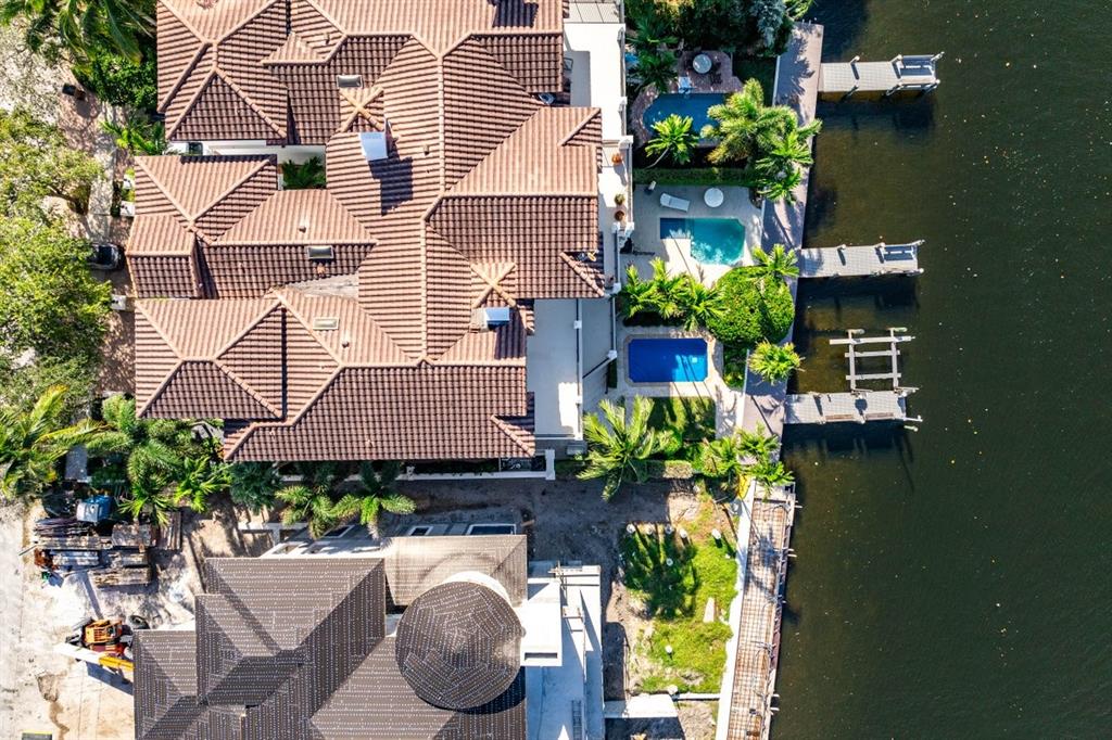 549 Northeast 19th Avenue, Unit C Deerfield Beach, FL 33441 - Photo 62 of 79 an aerial view of a house with swimming pool and outdoor seating