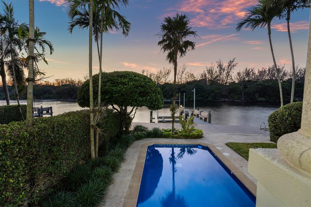 549 Northeast 19th Avenue, Unit C Deerfield Beach, FL 33441 - Photo 74 of 79 a view of a swimming pool and lounge chairs