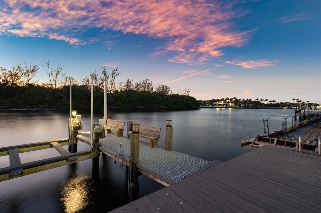 549 Northeast 19th Avenue, Unit C Deerfield Beach, FL 33441 - Photo 77 of 79 a view of a lake from a balcony with seating space