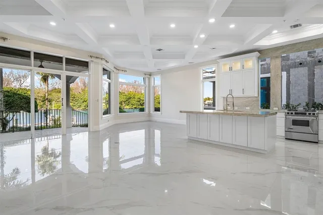 a view of a patio with couches chairs and a table