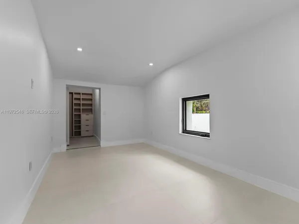 an empty room with a window