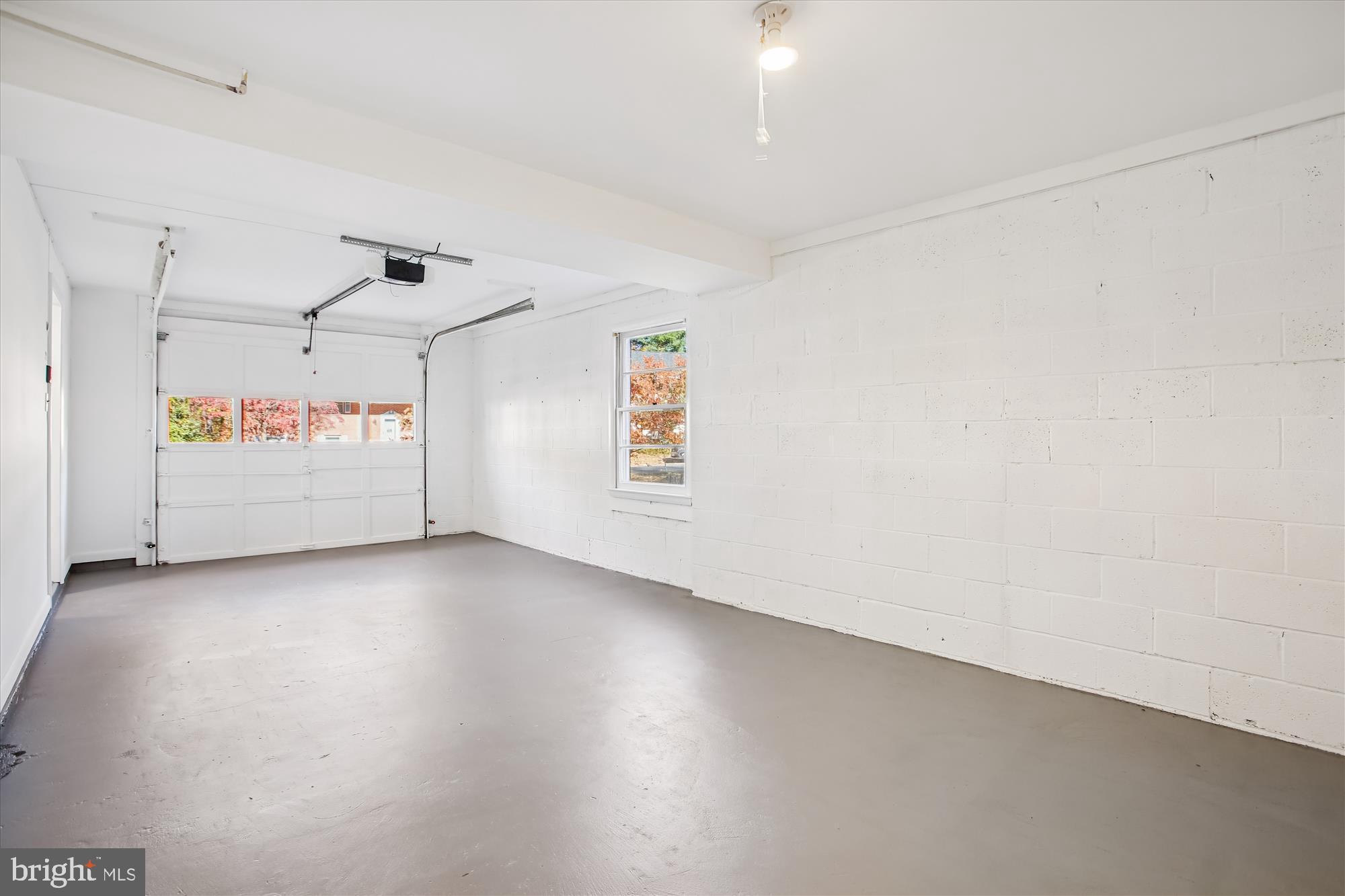 9075 Andromeda Drive Burke, VA 22015 - Photo 25 of 30 Spacious garage with natural light.