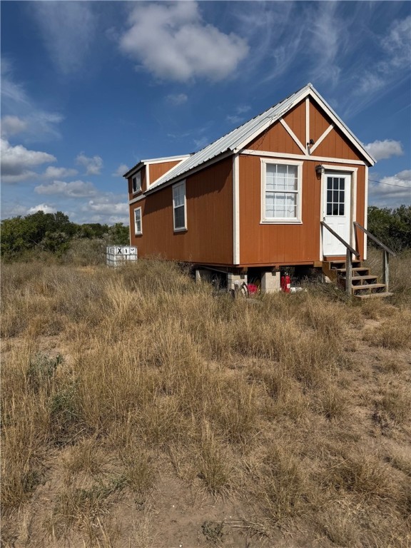 2979 Bravo Road 2 Freer, TX 78357 - Photo 12 of 25 a front view of a house with a yard