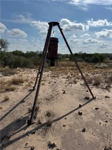 a view of roof deck with a lake