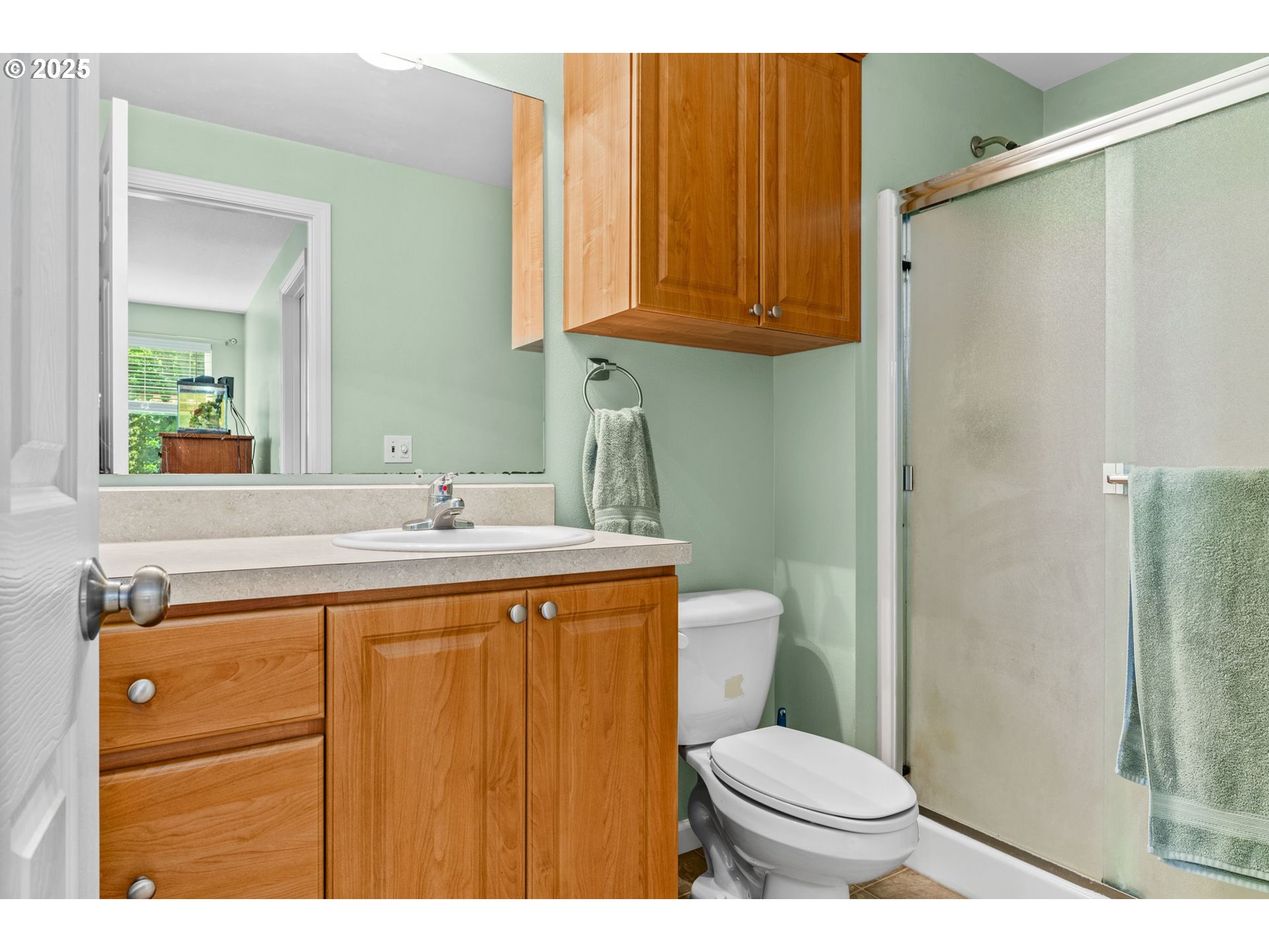 34637 Knox Butte Road East Albany, OR 97322 - Photo 20 of 47 a bathroom with a sink a toilet and shower