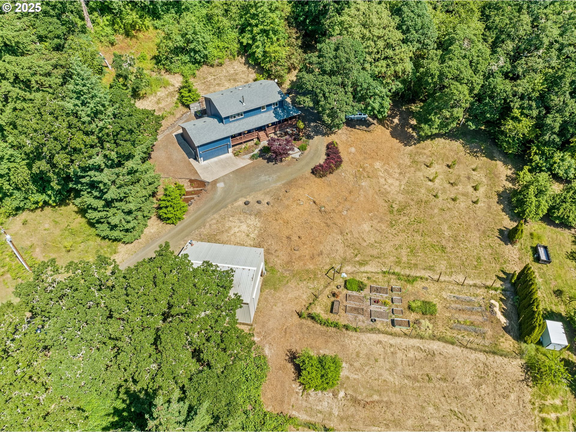 34637 Knox Butte Road East Albany, OR 97322 - Photo 35 of 47 an aerial view of a house with a yard and garden