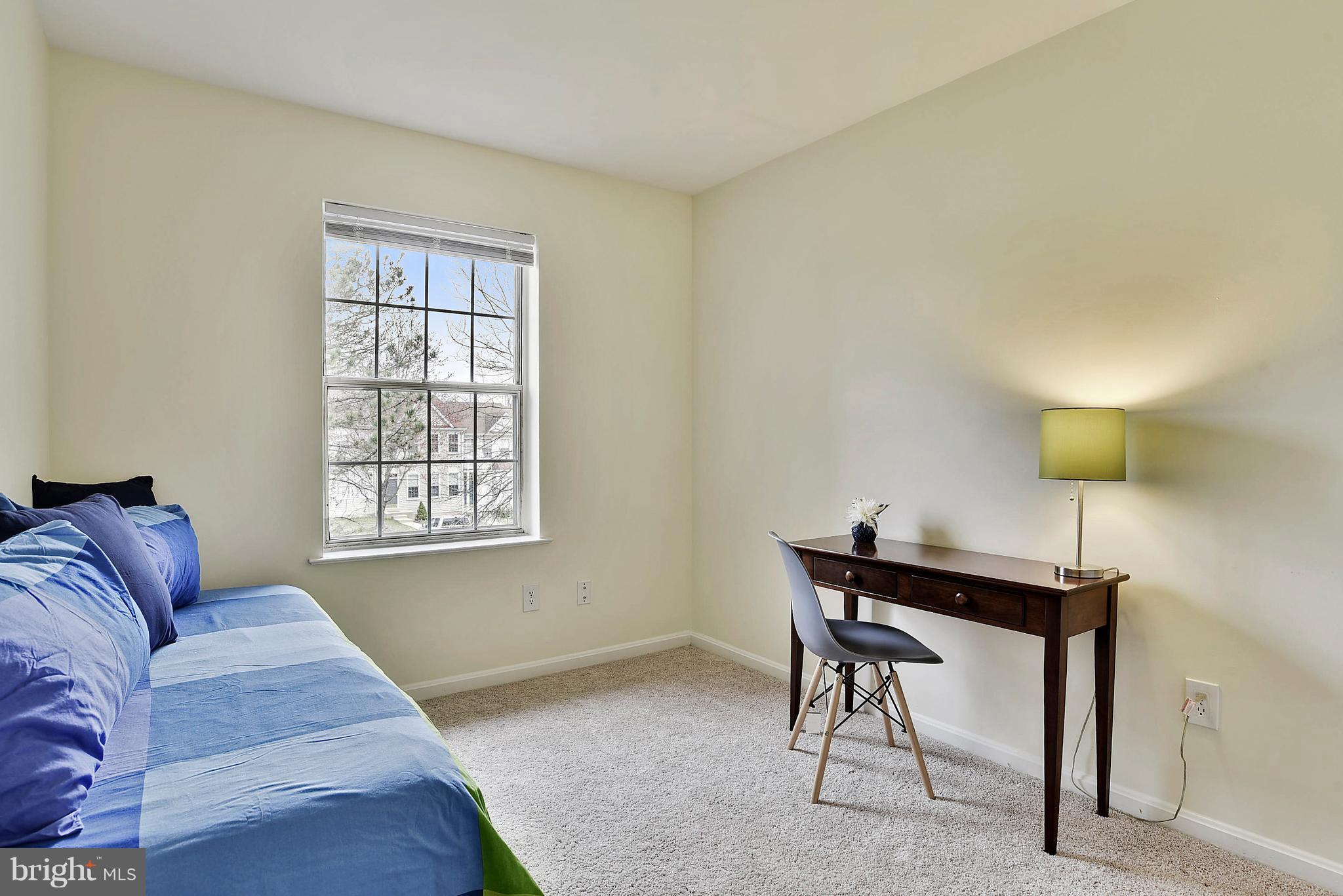 14802 Rydell Road, Unit 202 Centreville, VA 20121 - Photo 20 of 27 a living room with a couch and a window