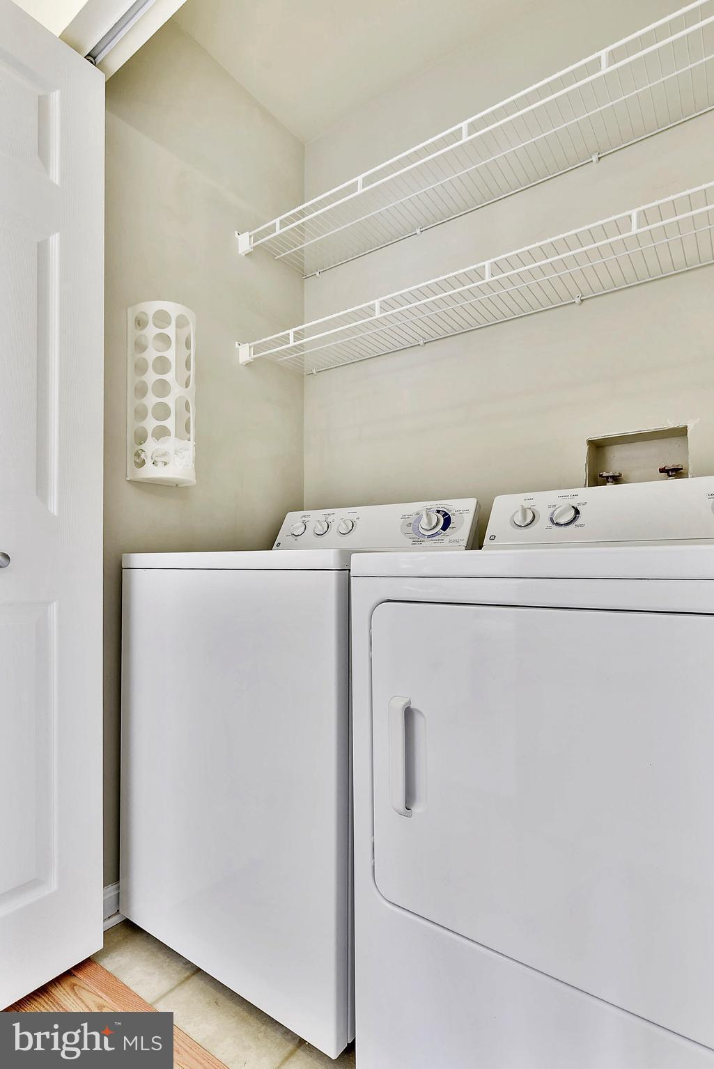 14802 Rydell Road, Unit 202 Centreville, VA 20121 - Photo 23 of 27 a utility room with dryer and washer
